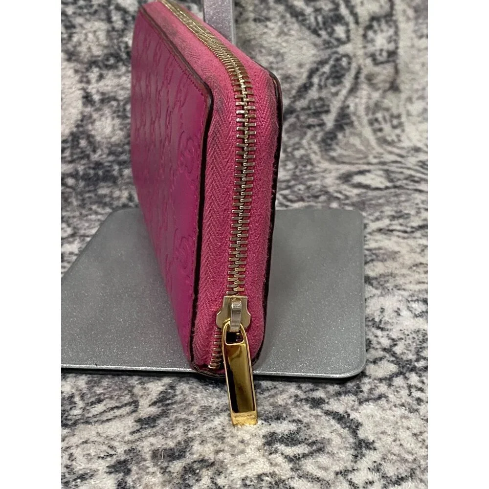 Gucci Guccissima Bow Zip Around Long Wallet in Fuschia
